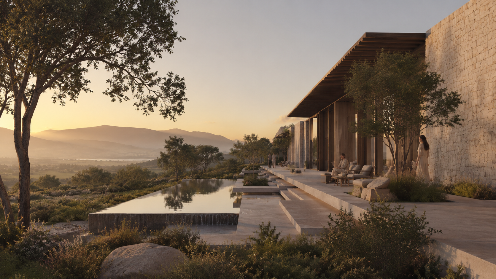 Infinity pool terrace overlooking hills at sunset with stone architecture